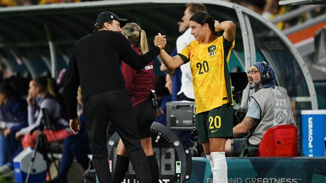 Sam Kerr shakes hands with head coach Tony Gustavsson as she is brought on. Picture: Getty