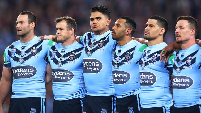 Latrell Mitchell, Josh Addo-Carr and Cody Walker refused to sing the national anthem before game one of last year’s Origin series in Brisbane. Picture: Cameron Spencer/Getty Images