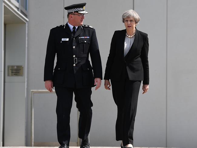 Prime Minister Theresa May talks with Chief Constable of Greater Manchester Police Ian Hopkins. Picture: Getty