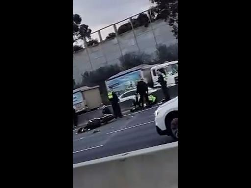 Police motorcycle crash on Tullamarine freeway