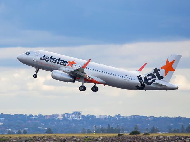 SYDNEY, AUSTRALIA - NewsWire Photos JUNE 14, 2021: A view of a Jetstar plane taking off at Sydney Domestic Airport from Port Botany in Sydney Australia. Picture: NCA NewsWire / Gaye Gerard