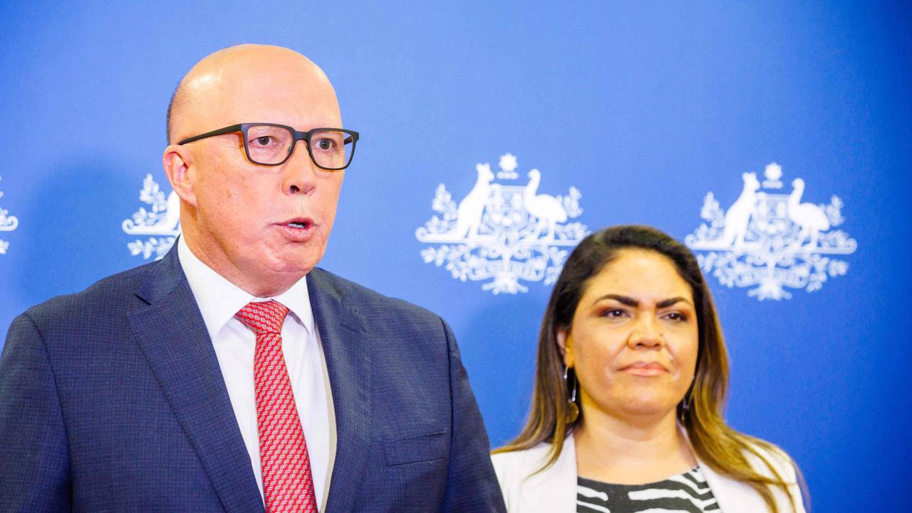 (FILES) Shadow minister for Indigenous Australians Jacinta Nampijinpa Price (R) and Opposition Leader Peter Dutton attend a press conference following the results of Australia's historic Indigenous rights referendum, in Brisbane on October 14, 2023. Australia holds a general election May 3, 2025, a hard-fought contest between party leaders with sharply contrasting visions for the country. (Photo by Patrick HAMILTON / AFP)