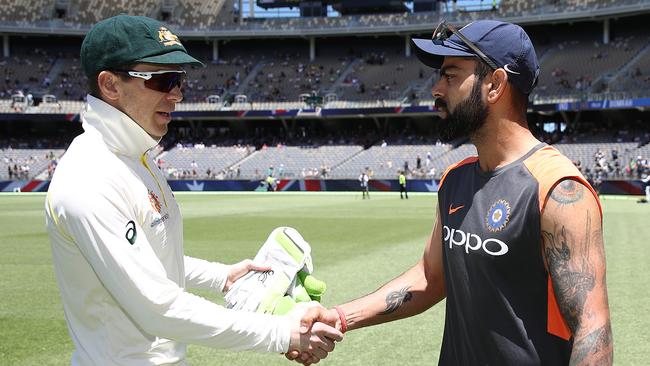 Tim Paine has the honour of shaking the great Virat Kohli’s hand. Rumours abound that he has vowed to never wash his hand again.