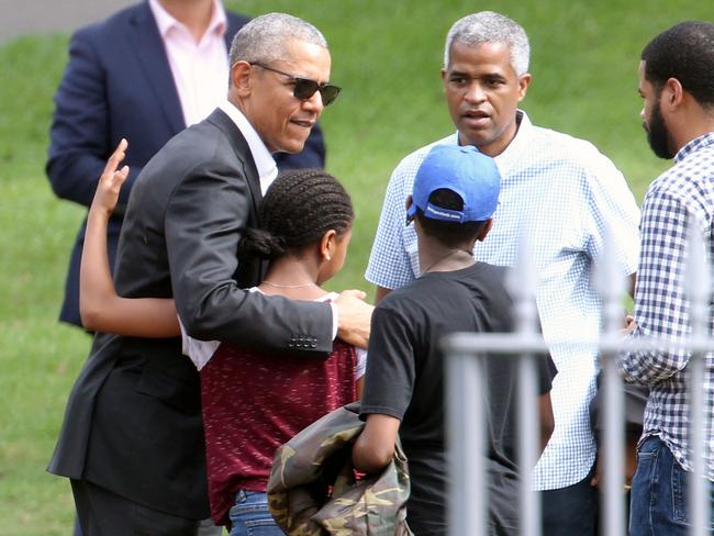 Barack Obama pictured on the rear lawn of Government House overlooking the Opera House. Picture: Matrix Media Group