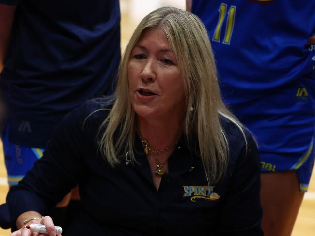 BENDIGO, AUSTRALIA - DECEMBER 08: Tracy York, head coach of the Spirit talks to her players during three quarter time during the round two WNBL match between Bendigo Spirit and Melbourne Boomers at Bendigo Stadium, on December 08, 2021, in Bendigo, Australia. (Photo by Mike Owen/Getty Images)