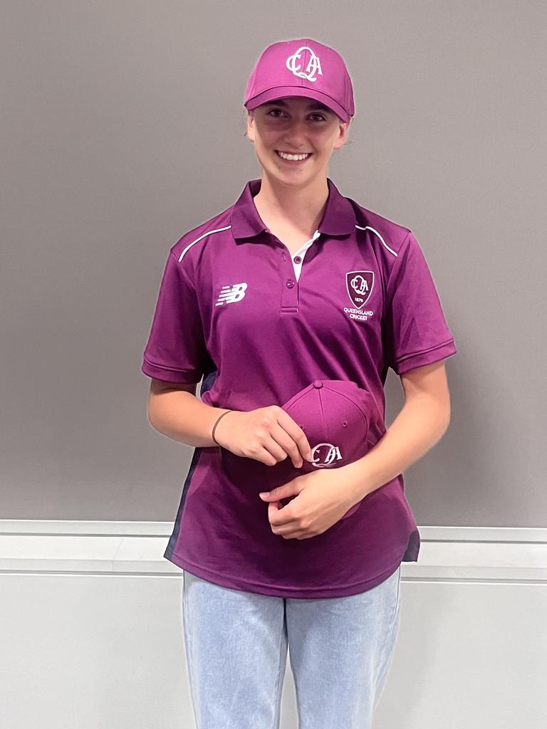 Lilli Hamilton after receiving her Queensland cricket caps for under-16s and under-19s.