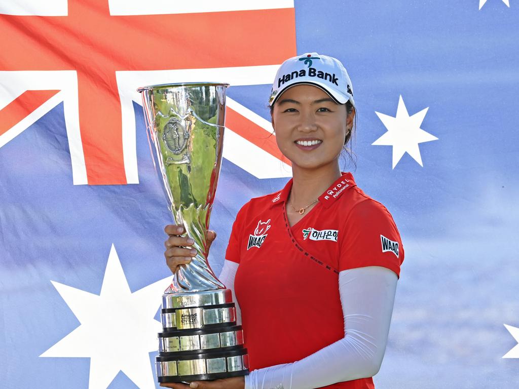 EVIAN-LES-BAINS, FRANCE - JULY 25: Tournament winner Minjee Lee of Australia poses for a photo with her trophy during day four of the The Amundi Evian Championship at Evian Resort Golf Club on July 25, 2021 in Evian-les-Bains, France. (Photo by Stuart Franklin/Getty Images)