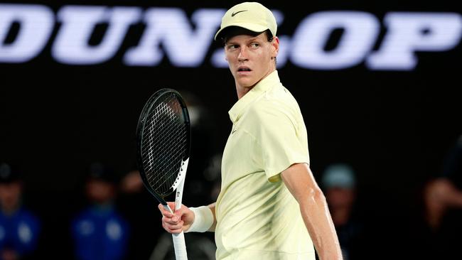 Italy's Jannik Sinner reacts to a point against Germany's Alexander Zverev during their men's singles final match on day fifteen of the Australian Open tennis tournament in Melbourne on January 26, 2025. (Photo by Martin KEEP / AFP) / -- IMAGE RESTRICTED TO EDITORIAL USE - STRICTLY NO COMMERCIAL USE --