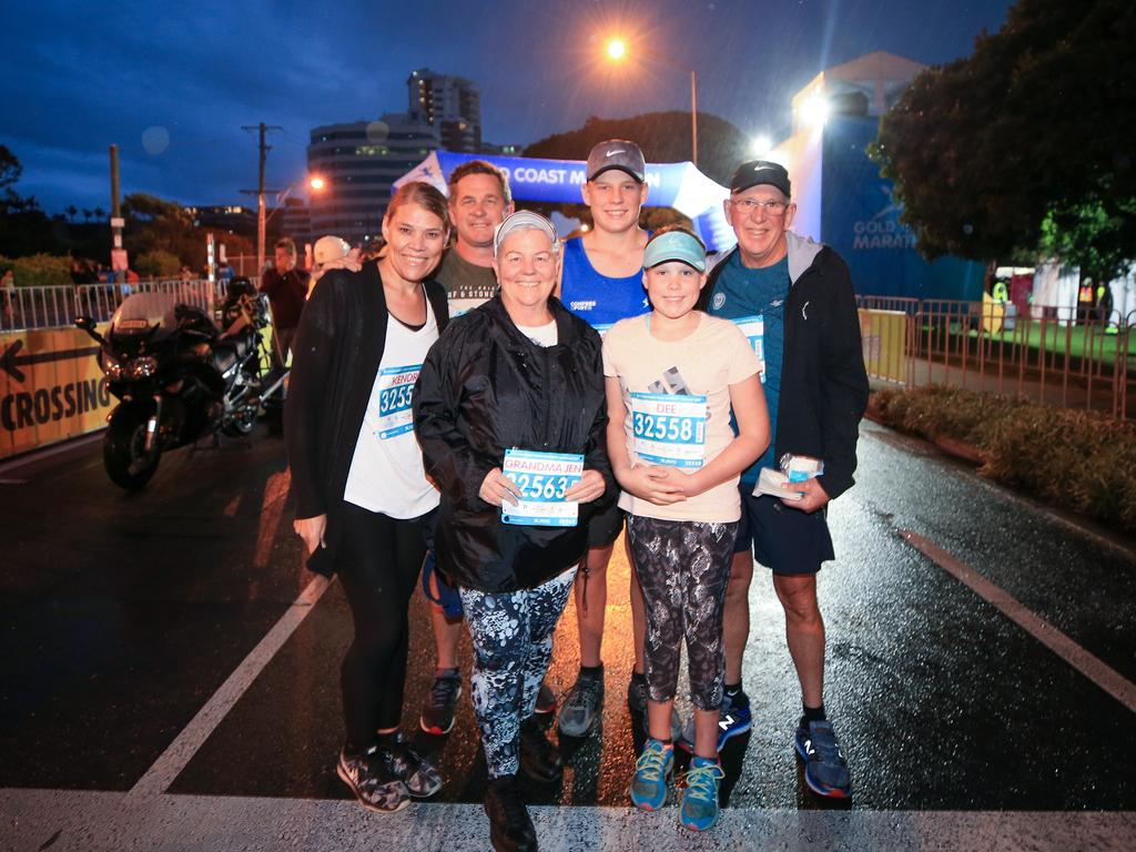 Jarrod and Kendra Cooper, Kennedee and Cooper (kids), Jennie and Bruce (grandparents) have a photo taken prior to competing in the Southern Cross University 10 kilometre Run. Picture: Tim Marsden.