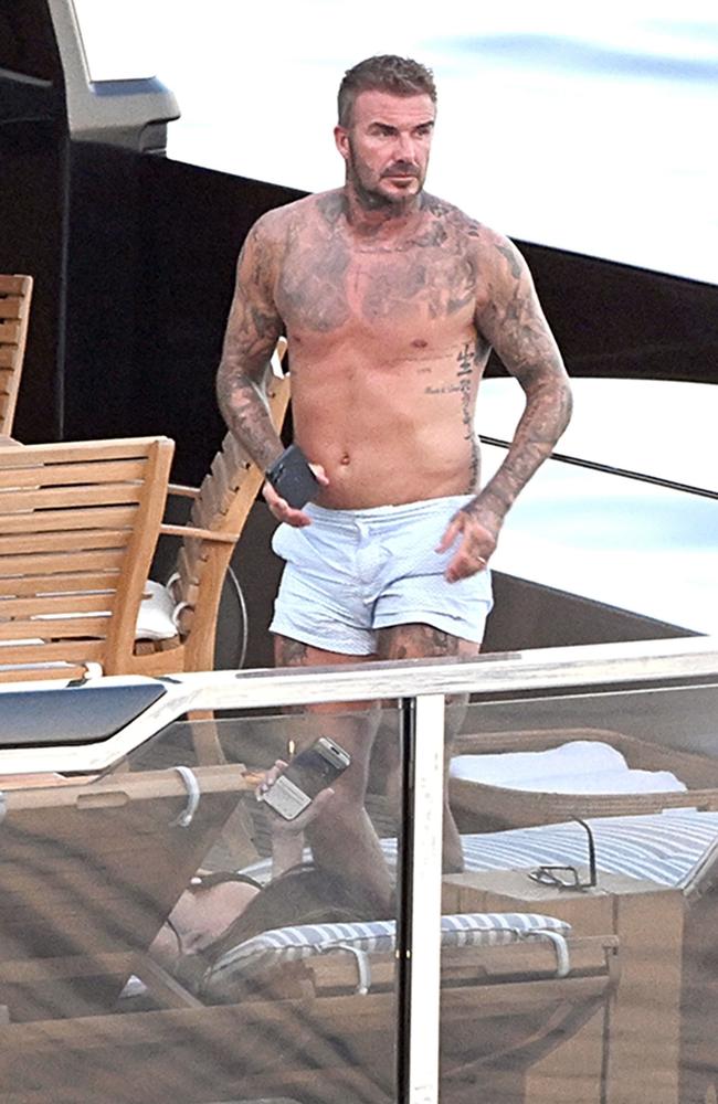 Beckham seemed to be in good spirits as he soaked up the sun. Picture: Backgrid.