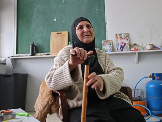 Fatima Yazbek, a displaced person from Lebanon's town of Naqura, sits in a school where she is taking shelter after she fled her hometown during the war. Picture: AFP