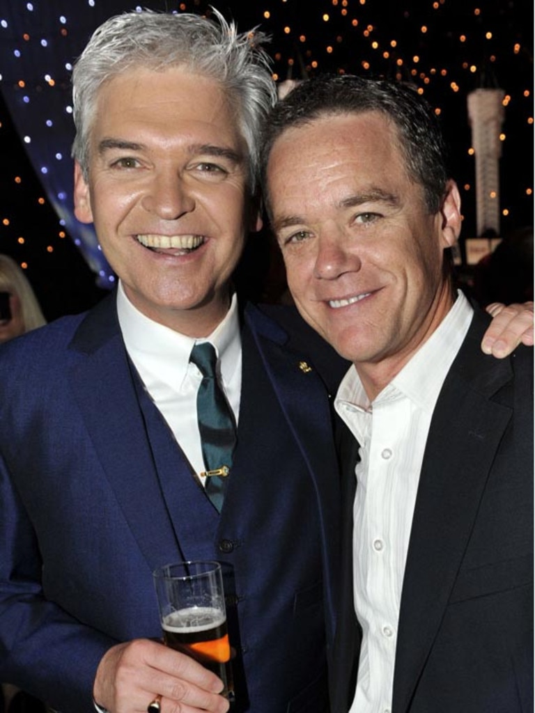 Stefan Dennis (left) with Phillip Schofield when he hosted the British Soap Awards. Picture: TV Guide