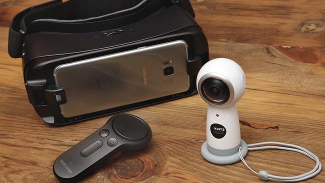 The New Samsung Gear 360 camera, right, Gear VR headset, and controller are displayed during a preview in New York. Picture: AP Photo/Richard Drew