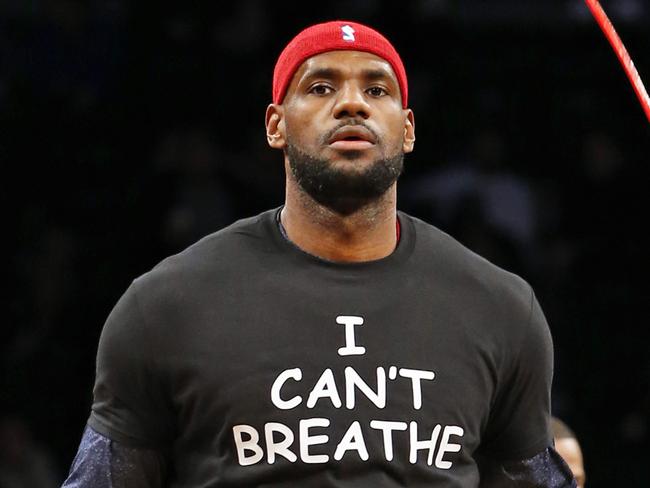 Cleveland Cavaliers forward LeBron James warms up before an NBA basketball game against the Brooklyn Nets at the Barclays Center, Monday, Dec. 8, 2014, in New York. Professional athletes have worn "I Can't Breathe" messages in protest of a grand jury ruling not to indict an officer in the death of a New York man. (AP Photo/Kathy Willens)