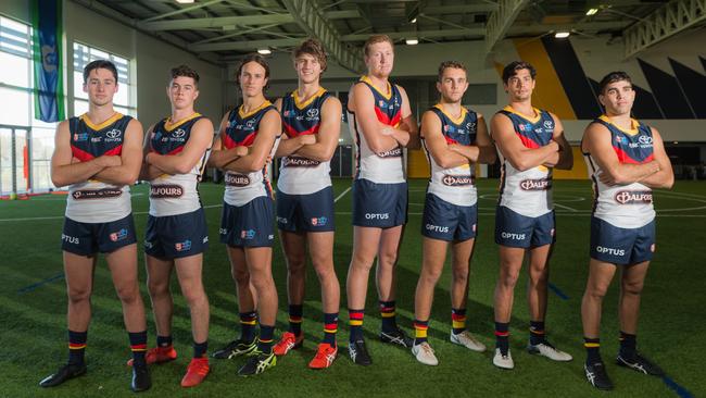 Adelaide’s 2018 draftees at the training facility in West Lakes. Left to right: Chayce Jones, Ned McHenry, Will Hamill, Jordan Butts, Kieran Strachan, Lachlan Sholl, Shane McAdam, Tyson Stengle. Picture: Alex Aleshin