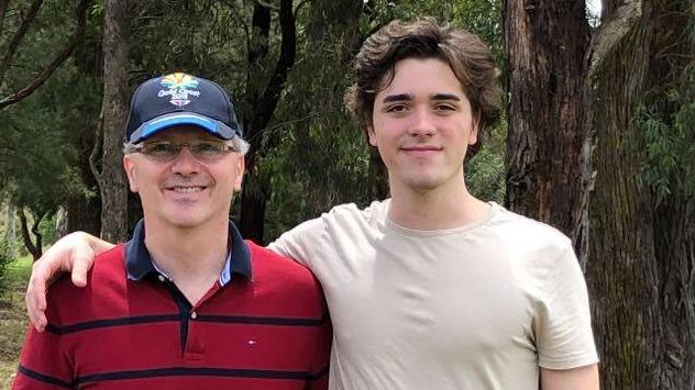 Ben Reilly (right) with his dad. Picture: supplied