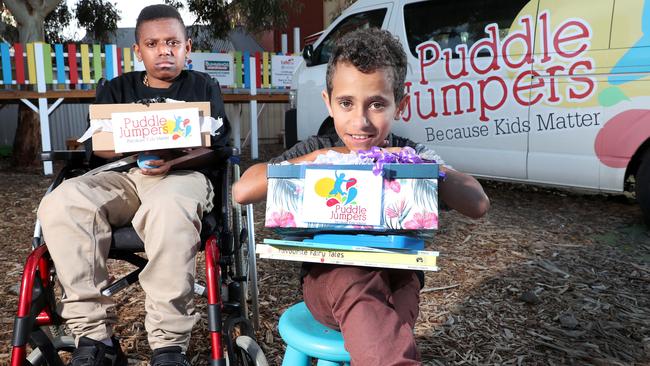 Torry, 12, and Brenton, 10, at Puddle Jumpers, where shooting victim Chelsea Ireland volunteered. Picture: Sarah Reed