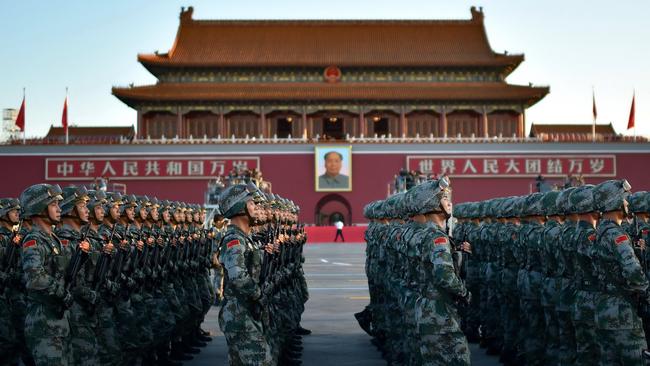 Chinese PLA soldiers march past the Tian'anmen Rostrum during a military parade in Beijing earlier this month.