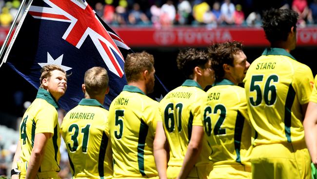 Australian captain Steve Smith sings the national anthem before the First ODI at the Melbourne Cricket Ground.