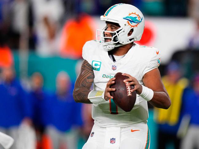 MIAMI GARDENS, FLORIDA - JANUARY 07: Tua Tagovailoa #1 of the Miami Dolphins looks to pass during the first quarter against the Buffalo Bills at Hard Rock Stadium on January 07, 2024 in Miami Gardens, Florida.   Rich Storry/Getty Images/AFP (Photo by Rich Storry / GETTY IMAGES NORTH AMERICA / Getty Images via AFP)