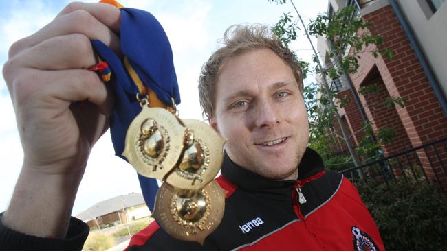 Campbelltown City’s Simon Catanzaro, with his third Sergio Melta Super League medal in 2008.