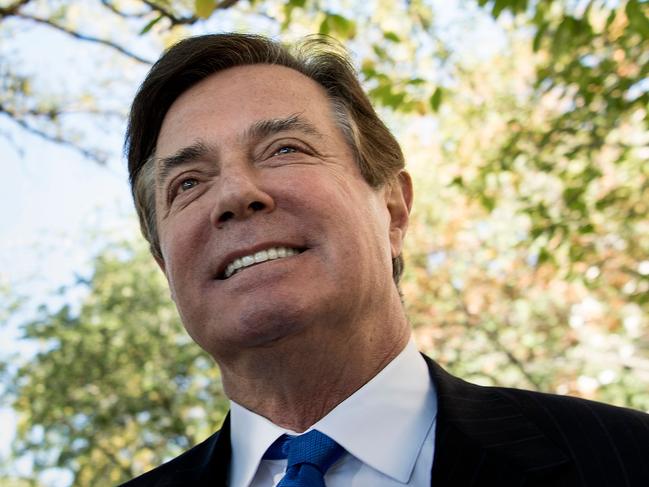 Paul Manafort, former campaign manager for US President Donald Trump, leaves the E. Barrett Prettyman United States Court House after being charged October 30, 2017 in Washington, DC. President Donald Trump's former campaign chairman Paul Manafort pleaded not guilty Monday to charges of conspiracy and money laundering after the Justice Department unveiled the first indictments in the probe into Russian election interference. Manafort, 68, and business partner Rick Gates, 45, both entered not guilty pleas in a Washington court after being read charges that they hid millions of dollars they earned working for former Ukrainian politician Viktor Yanukovych and his pro-Moscow political party.  / AFP PHOTO / Brendan Smialowski