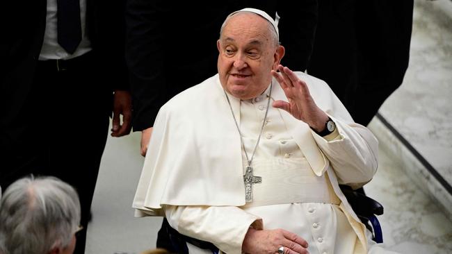 Pope Francis greets people at the end of an audience to the participants of the Pilgrimage Episcopal Conference of Scandinavia, at Paul-VI hall in The Vatican. Picture: AFP