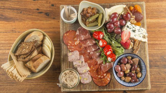 Charcuterie with sourdough and cornichons. Picture: Rob Leeson