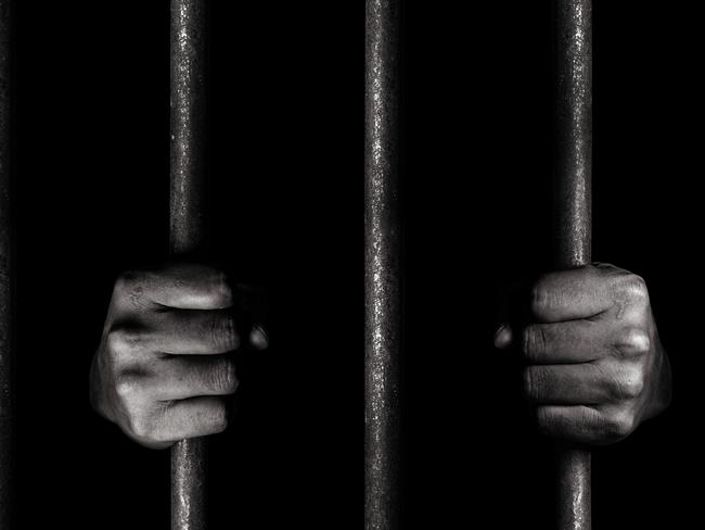 Hands of the prisoner istock