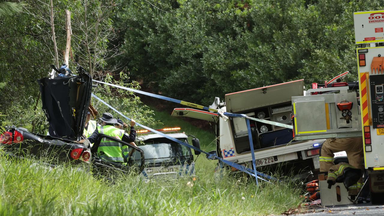 The scene on Old Gympie Road at Glasshouse Mountains where two people were killed after a tree fell on their car. Picture Lachie Millard