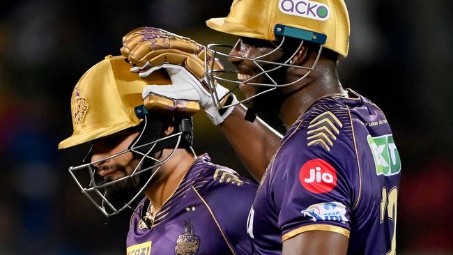 Kolkata Knight Riders' Rinku Singh, left, is congratulated by Andre Russell for his innings during the Indian Premier League Twenty20 cricket match against the Delhi Capitals. Picture: Dibyangshu Sarkar/AFP