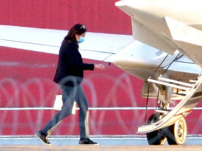 Premier Annastacia Palaszczuk boards a plane to Sydney en route to Tokyo for the Olympics. Photo: Steve Pohlner.