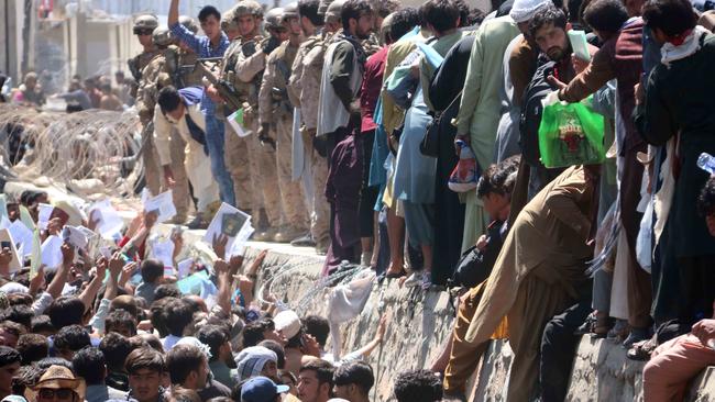 Chaotic scenes in 2021 as Afghans try to flee Hamid Karzai International Airport after the fall of Kabul to the Taliban. Picture: Supplied