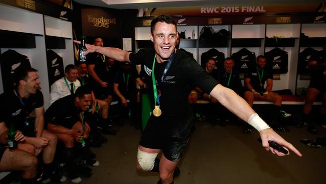 LONDON, ENGLAND - OCTOBER 31: Dan Carter of New Zealand celebrates in the dressing room following victory in the 2015 Rugby World Cup Final match between New Zealand and Australia at Twickenham Stadium on October 31, 2015 in London, United Kingdom. (Photo by Phil Walter/Getty Images)