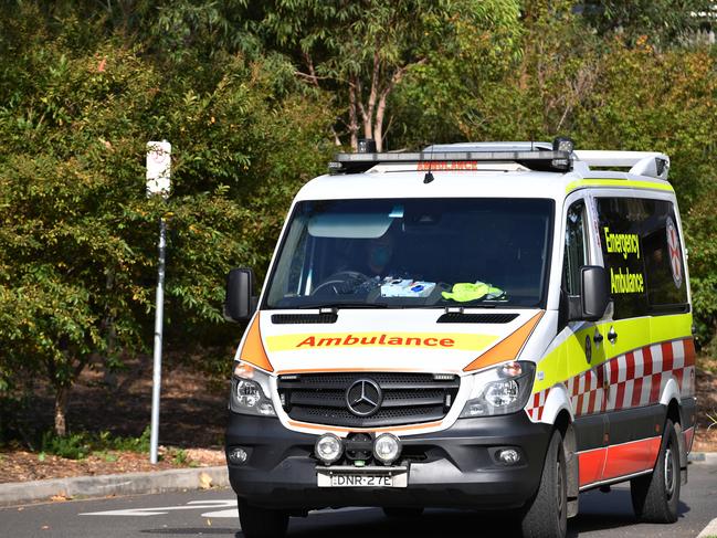 An ambulance leaves Newmarch House. Picture: AAP Image/Dean Lewins