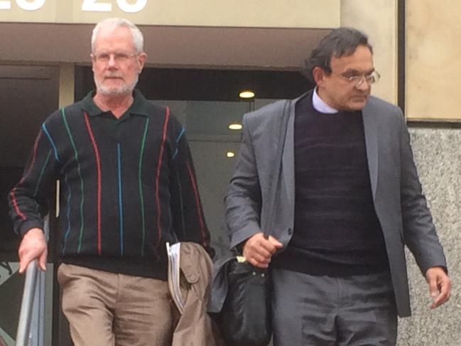 John Graham Preston (left) and his barrister Christopher Brohier (right) leave the Hobart Magistrates Court. Picture: DUNCAN ABEY