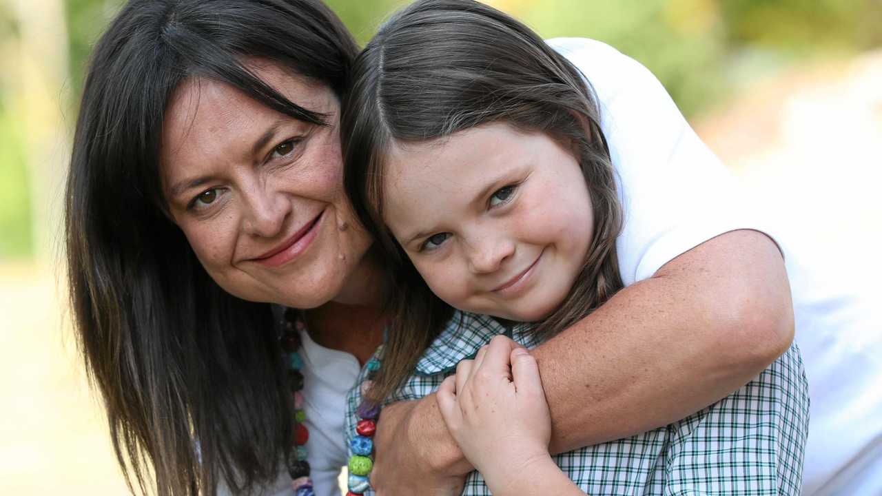 Yvette Miller and her daughter nine-year-old Harper Nielsen who recently made a protest at her school by not standing for the national anthem because of its lack of regard for Indigenous Australians. Picture: Annette Dew