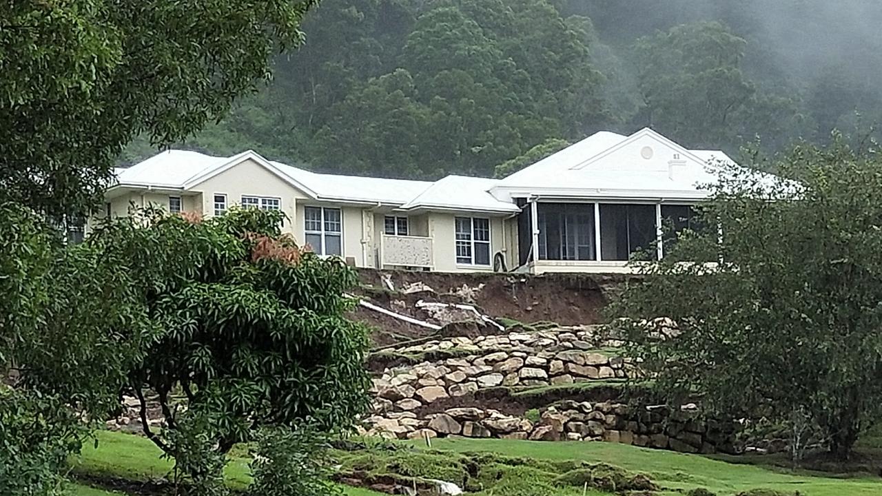 Heavy rain has caused land a small landslip in front of the house. Picture: Jerad Williams.