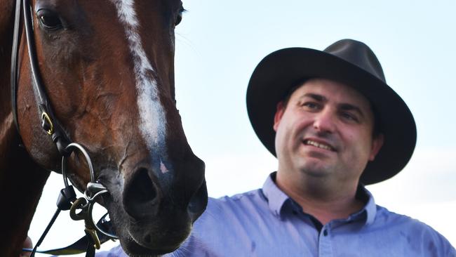 Queen of Kingston with trainer Daniel Bowen after it won the Beef Week Cup at Casino. The horse died after a race at Brisbane on the weekend. Photo Susanna Freymark