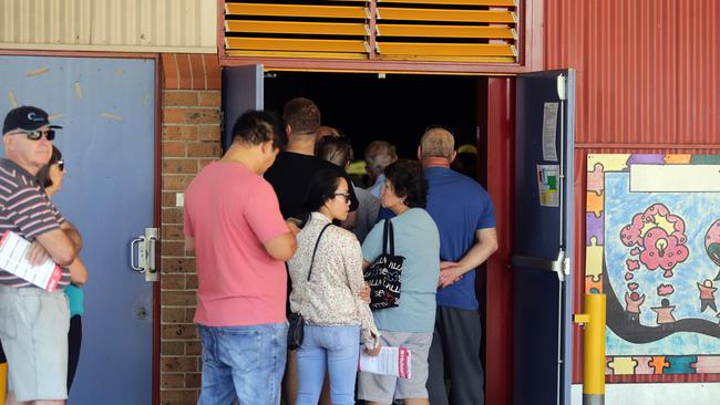 Queuing is testing the tolerance of Australians, according to social researchers.