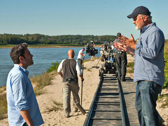 Ben Affleck, left, rehearses a scene with director David Fincher on the set of Gone Girl.