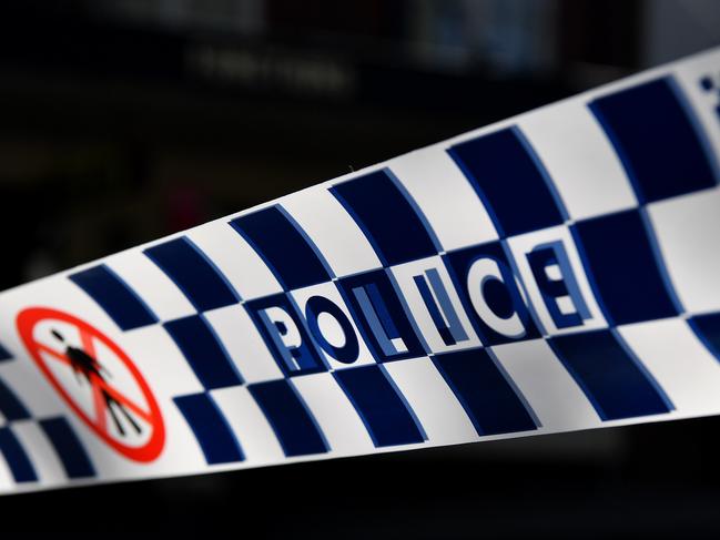 Police tape seen at a crime scene outside Penrith Police Station in Sydney, Thursday, October 3, 2019. A critical incident investigation is underway after a man was shot dead outside a western Sydney police station when he opened fire on officers with a shotgun, injuring one. (AAP Image/Joel Carrett) NO ARCHIVING