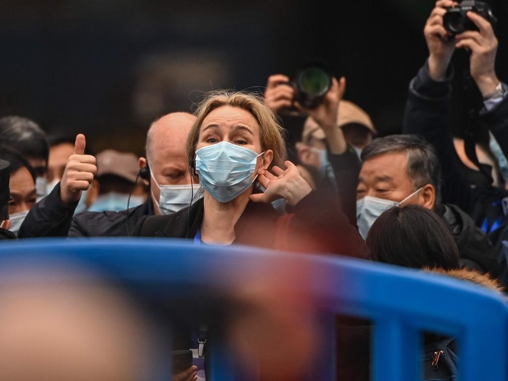 Thea Fisher and other members of the World Health Organisation team visit the closed Huanan Seafood wholesale market in Wuhan, China's central Hubei province on January 31. Picture: Hector Retamal / AFP