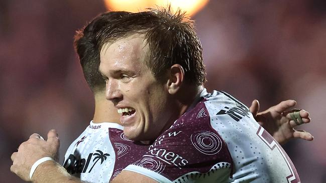 SYDNEY, AUSTRALIA - MAY 24:  JakeÃÂ Trbojevic and LukeÃÂ Brooks of the Sea Eagles celebrate winning the round 12 NRL match between Manly Sea Eagles and Melbourne Storm at 4 Pines Park on May 24, 2024, in Sydney, Australia. (Photo by Cameron Spencer/Getty Images)