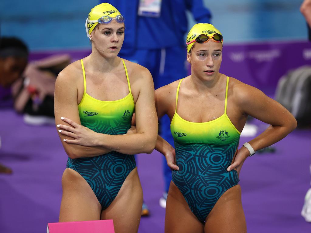 Shayna Jack and Jenna Forrester look on from the pool deck. Picture: Michael Klein