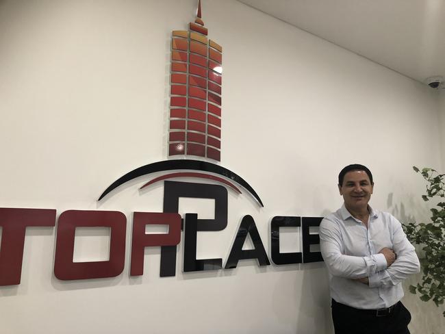 Nassif at the Toplace office.