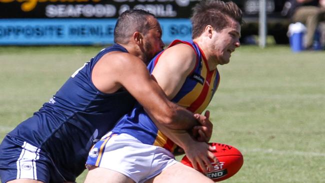 Action from Henley's clash with Old Ignatians in Round 2 of the Adelaide Footy League's Division 2.