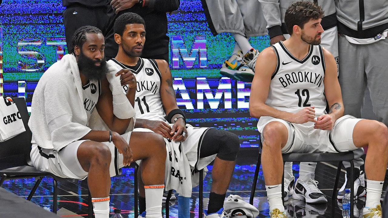 Brooklyn Nets stars James Harden (L) and Kyrie Irving (C) failed to combine in a disappointing defeat to the Cleveland Cavaliers.
