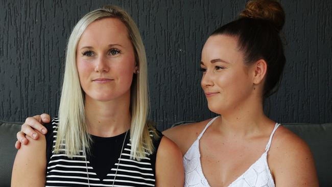 Angela Jay, with sister Danielle Walker, thought she was going to bleed to death after being stabbed by Paul Lambert after he broke into her Port Macquarie home. Picture: Toby Zerna