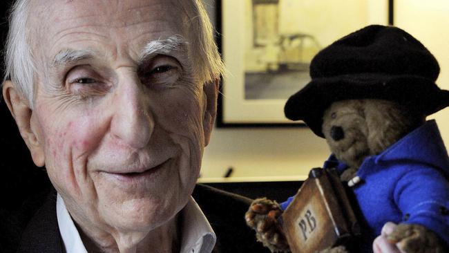 Michael Bond poses with a soft toy version of Paddington Bear in 2015.  Picture:  AP